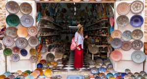 Woman browsing a store in Morocco