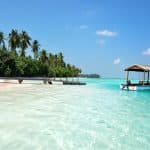 beach and a boat in the maldives