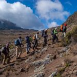 people climbing kilimanjaro