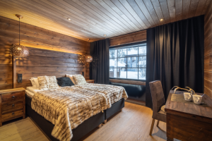 cosy plush bedding in wilderness cabin in Lapland