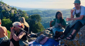 Group enjoying a meal in the Tuscan countryside