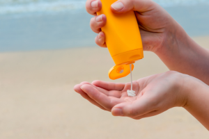 Person using biodegradable sunscreen in Costa Rica 