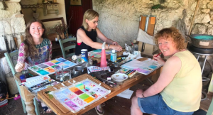 Group painting in french countryside