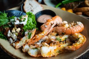 Delicious shrimp meal with bread and salad in Iceland