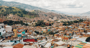 View over comuna 13 in Colombia with houses and rolling hills