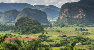 Beautiful green Cuban countryside with rolling mountains in the background