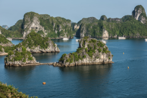 limestone islands pointing out of Ha Long Bay in Vietnam