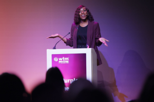 Jamie-lee delivering a keynote speech at WTM